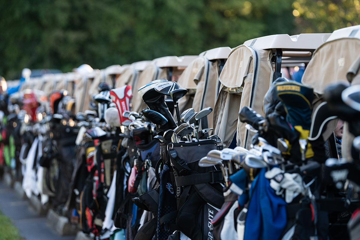 Golf bags on the back of golf carts