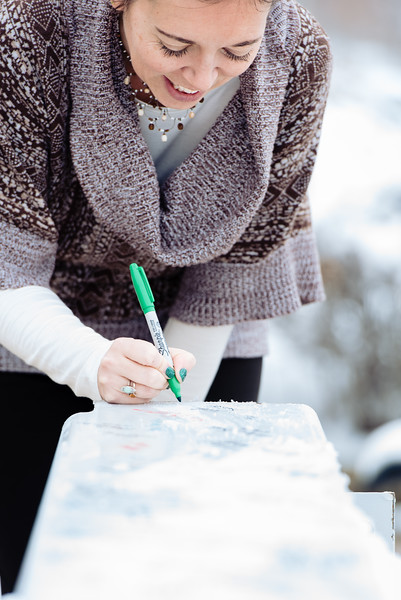 woman signing beam