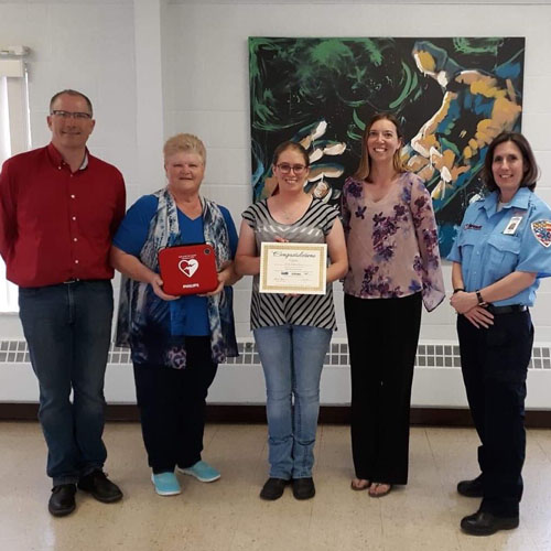 group  of employees with an award